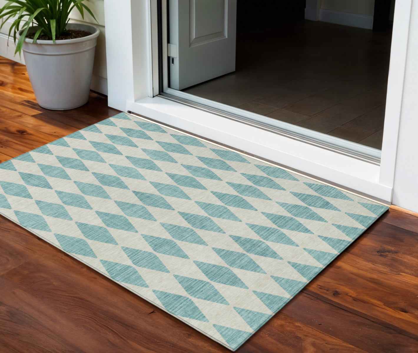 3' X 5' Teal Blue And Ivory Geometric Washable Indoor Outdoor Area Rug