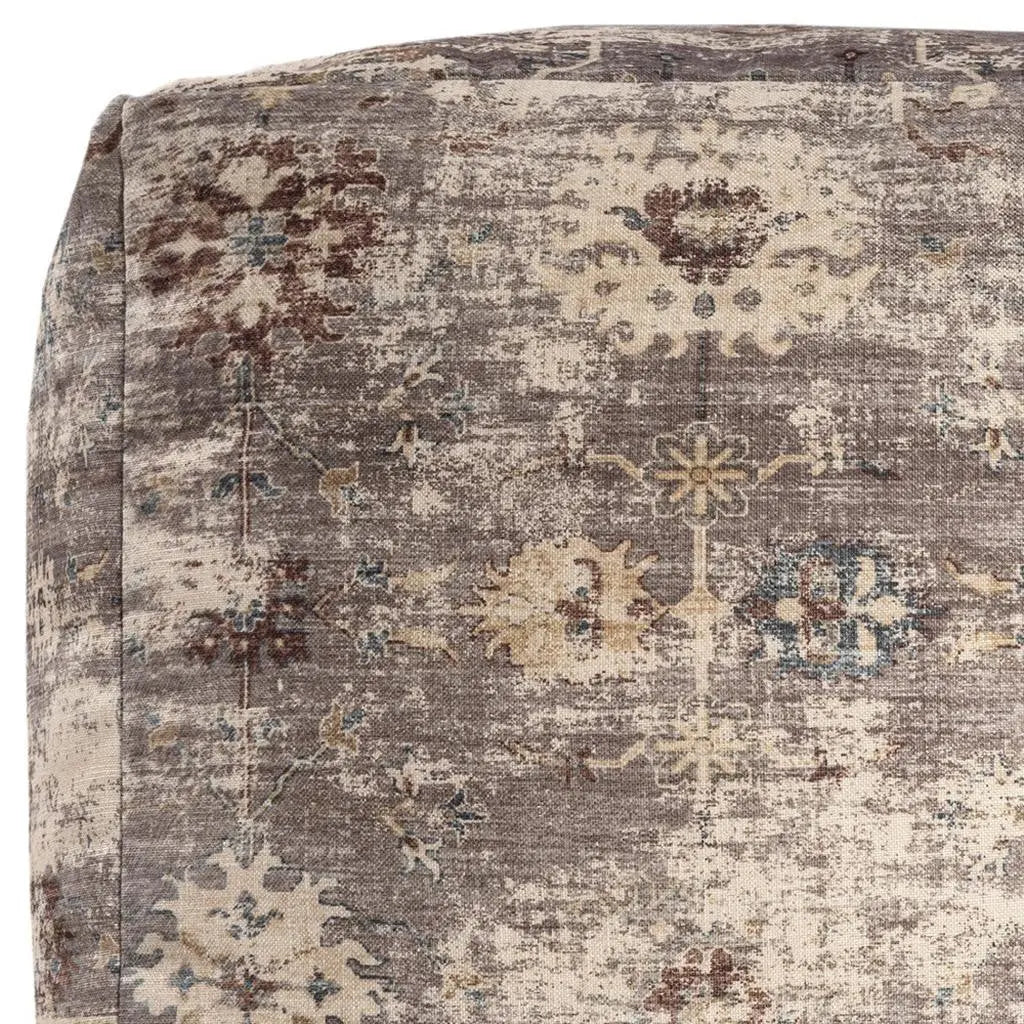 Gray floral-patterned accent pillow with cream, blue, and rust tones, crafted from soft polyester fabric.