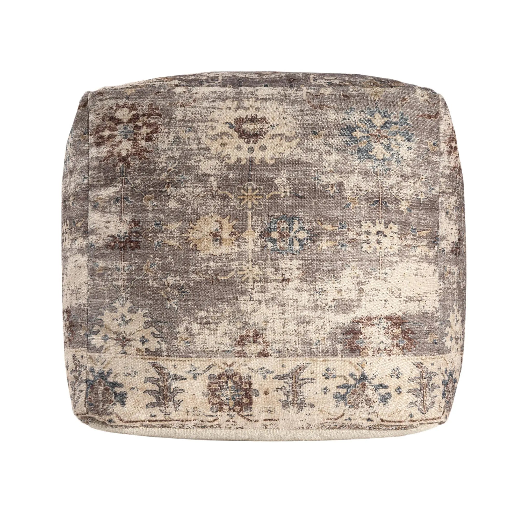 Vintage-style square pouf in muted gray and cream with intricate floral patterns, perfect for boho decor.