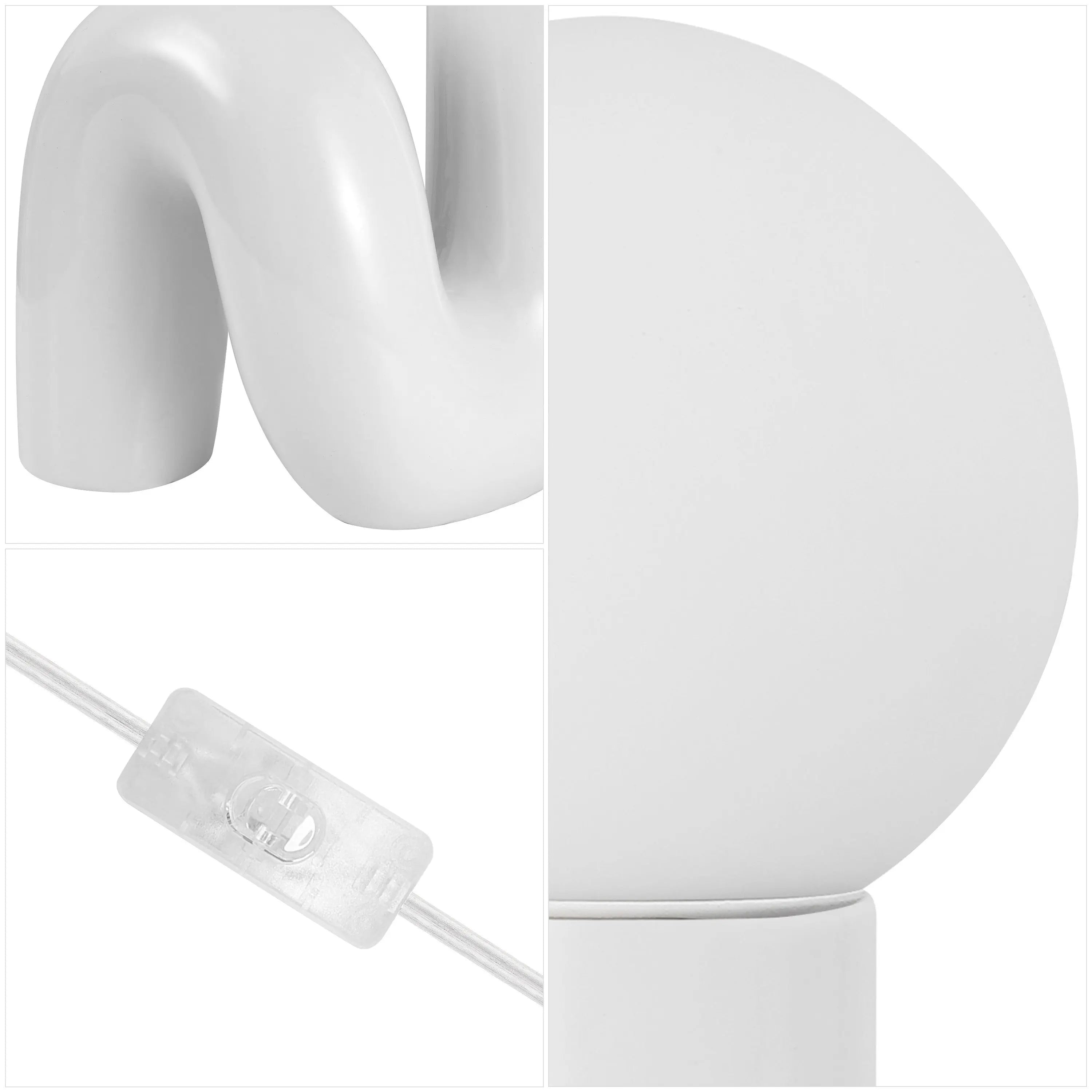 White ceramic table lamp with a curvy design and round shade, featuring a clear power switch and a sleek cord.
