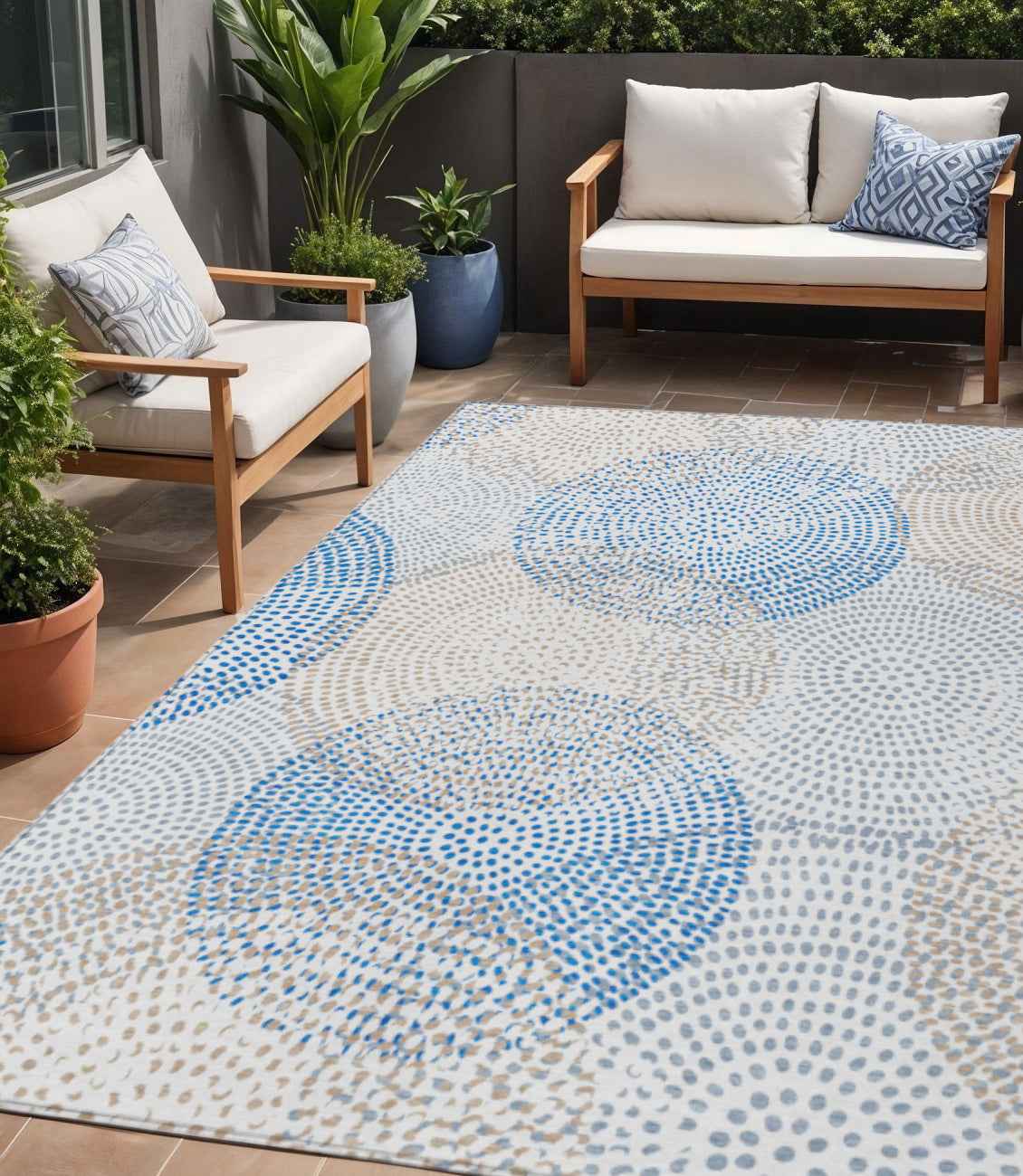 5' X 8' Ivory Blue And Taupe Polka Dot Washable Indoor Outdoor Area Rug