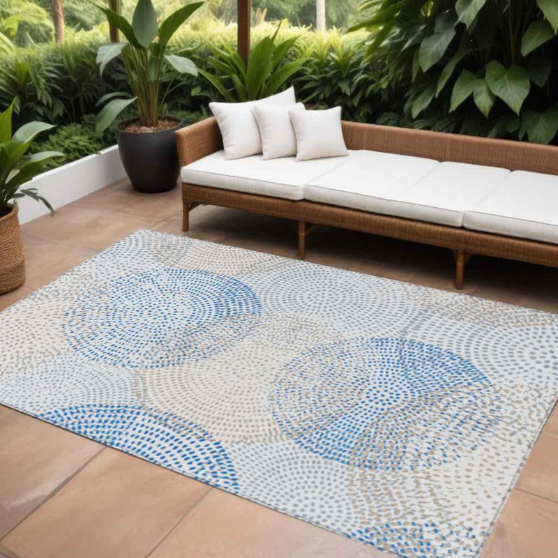 9' X 12' Ivory Blue And Taupe Polka Dot Washable Indoor Outdoor Area Rug