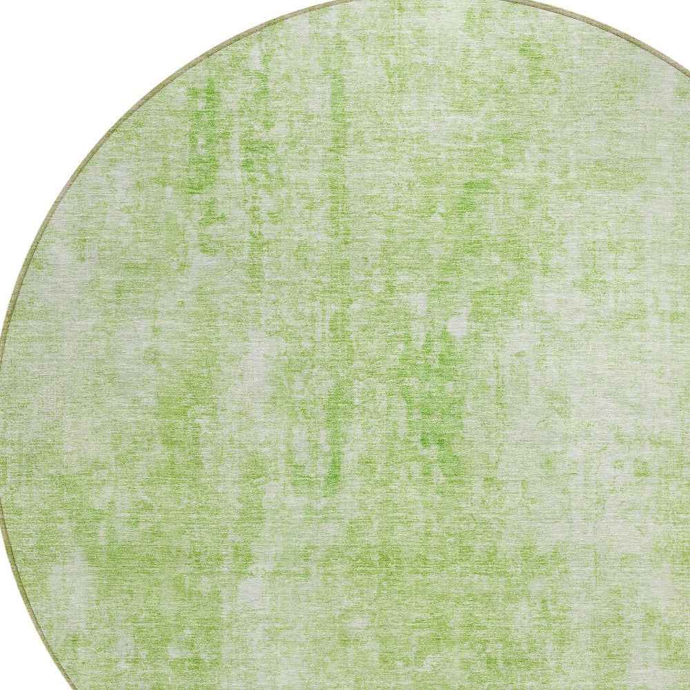 8' Green And Ivory Round Abstract Washable Indoor Outdoor Area Rug