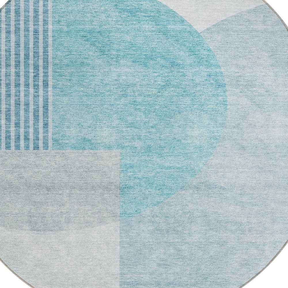 8' Teal Blue And Silver Round Geometric Washable Indoor Outdoor Area Rug