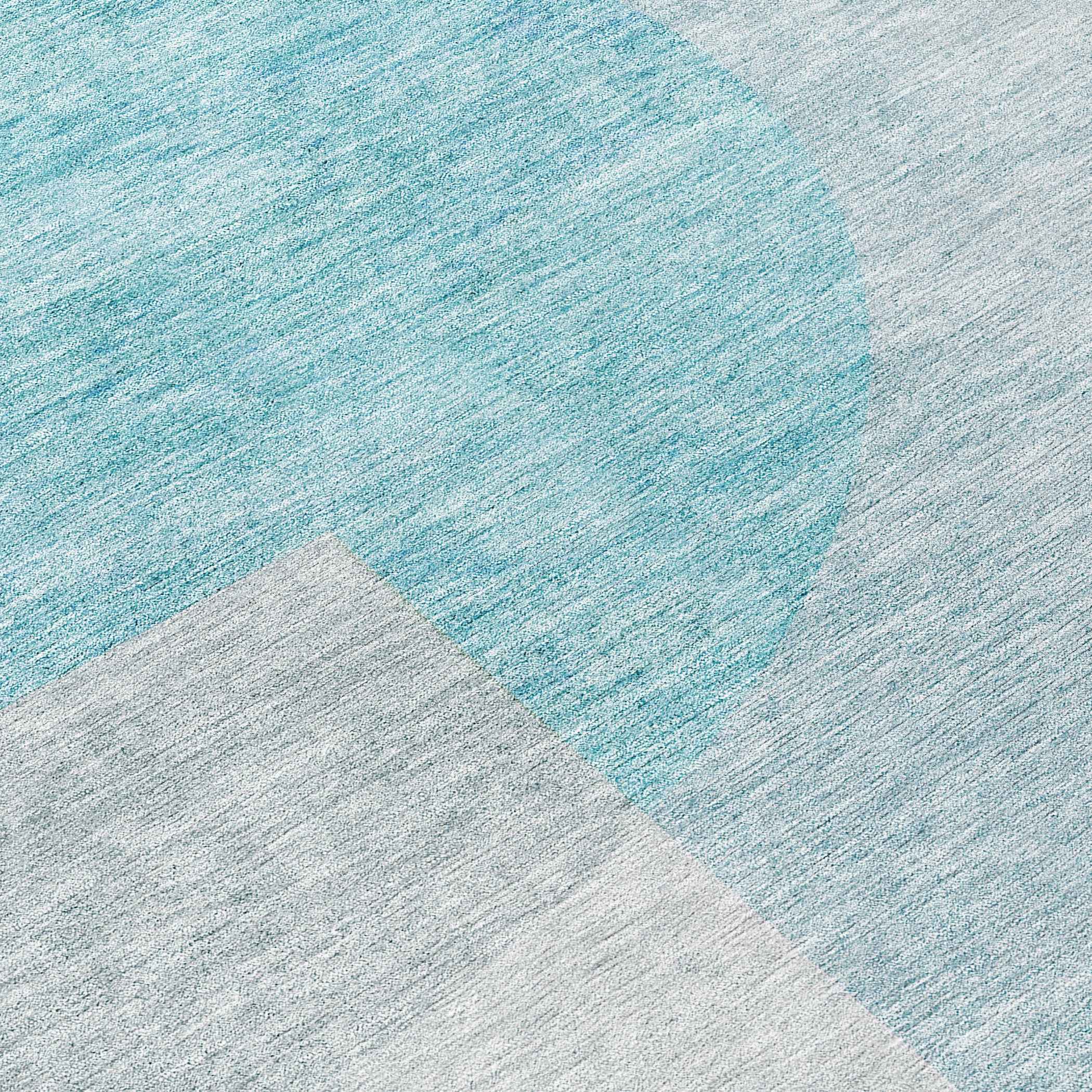 8' Teal Blue And Silver Round Geometric Washable Indoor Outdoor Area Rug
