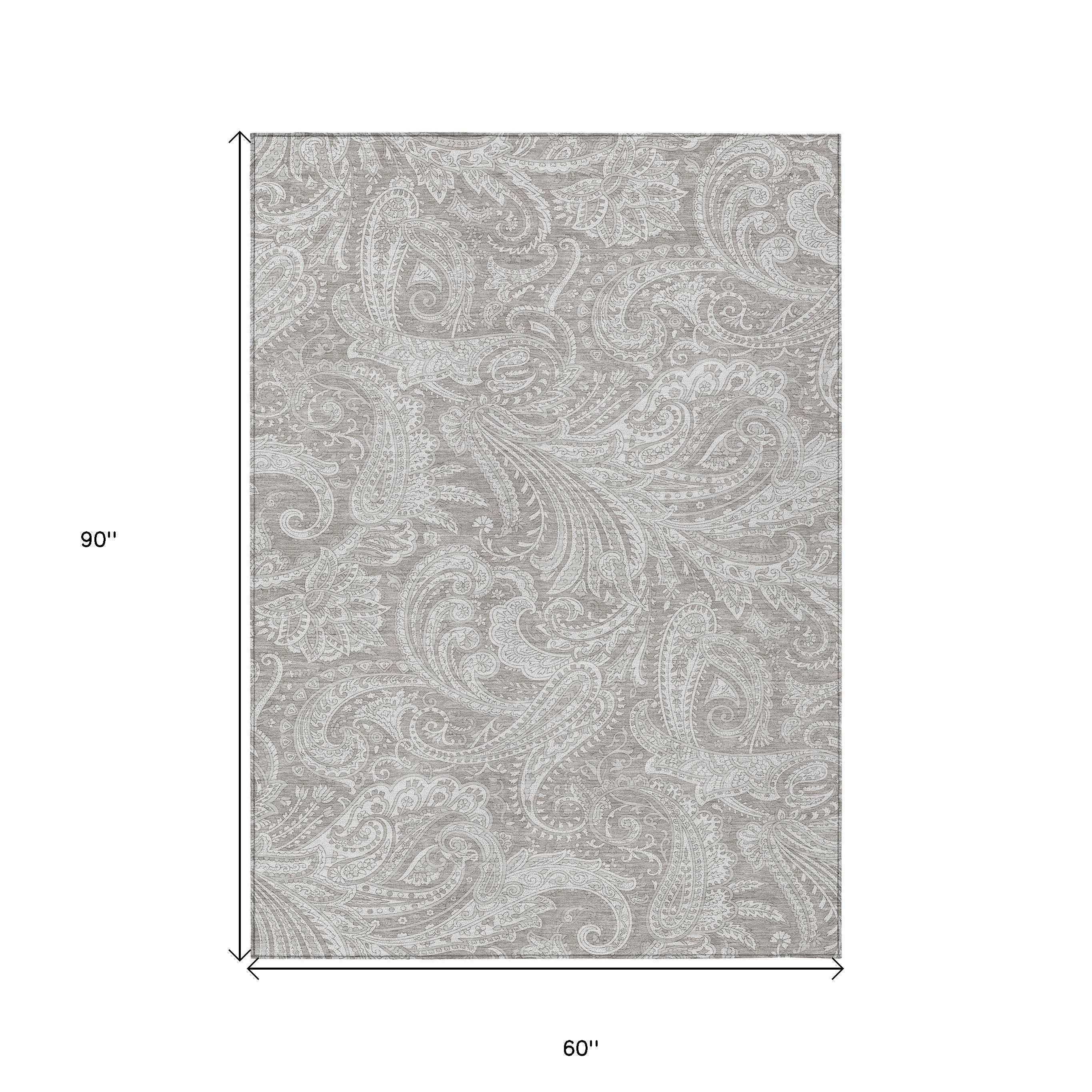 5' X 8' Taupe Beige And Ivory Paisley Washable Indoor Outdoor Area Rug