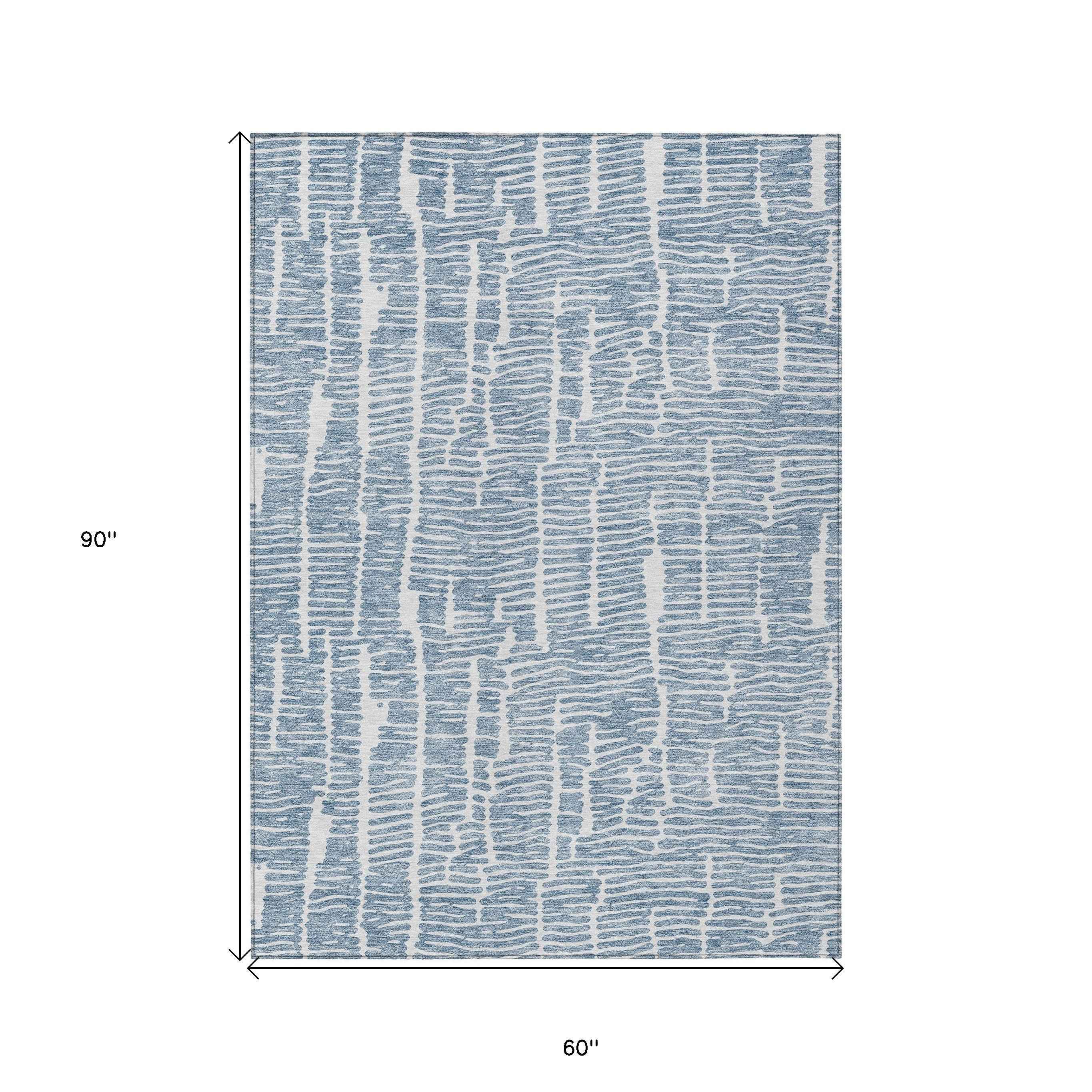 5' X 8' Blue And Ivory Abstract Washable Indoor Outdoor Area Rug