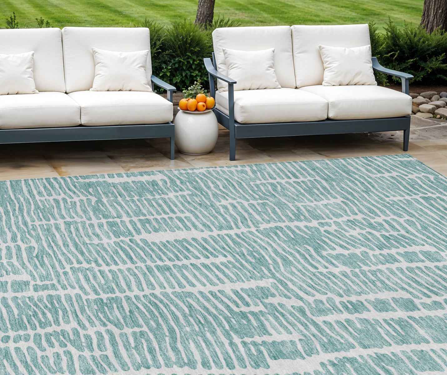 10' X 14' Teal Blue And Ivory Abstract Washable Indoor Outdoor Area Rug
