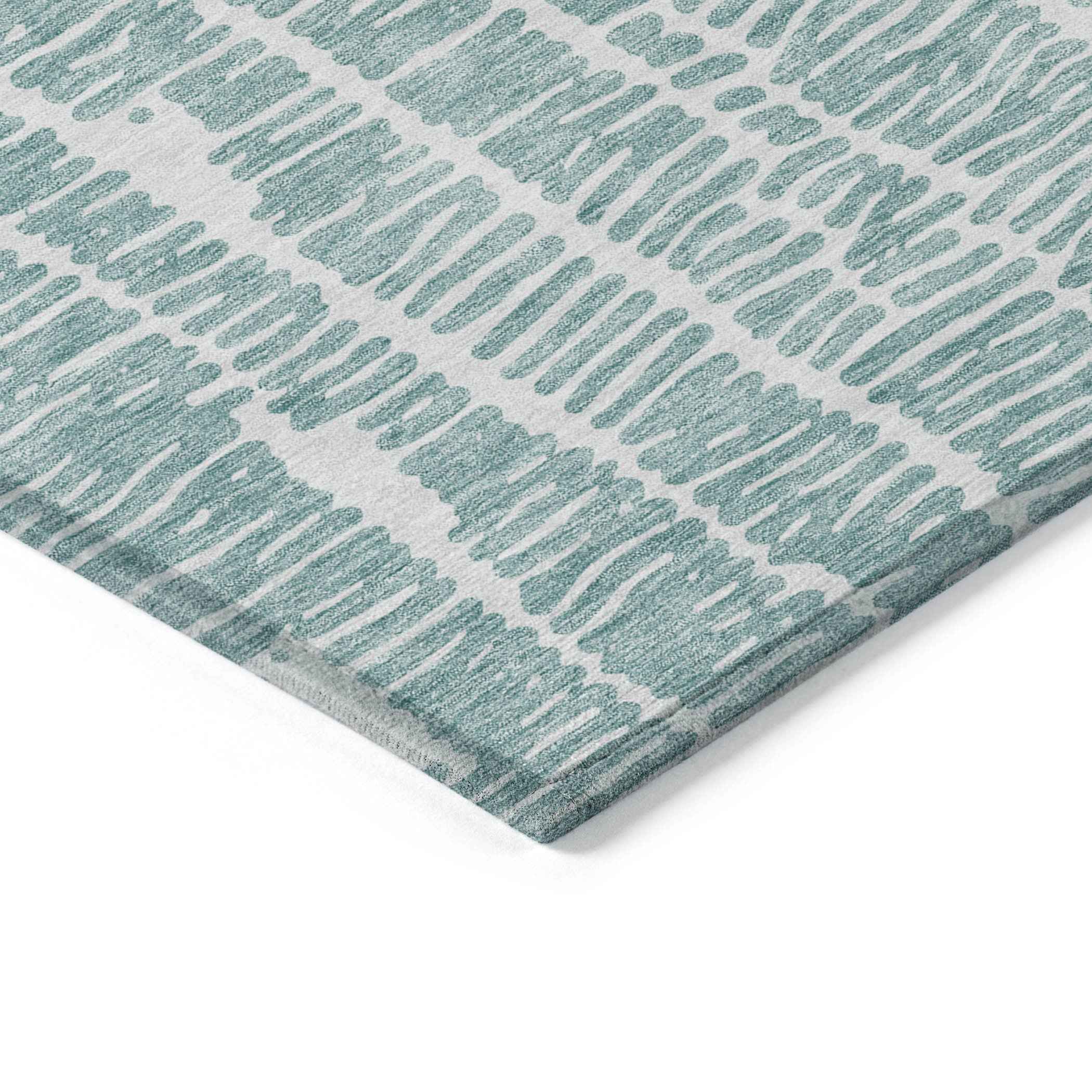 10' X 14' Teal Blue And Ivory Abstract Washable Indoor Outdoor Area Rug
