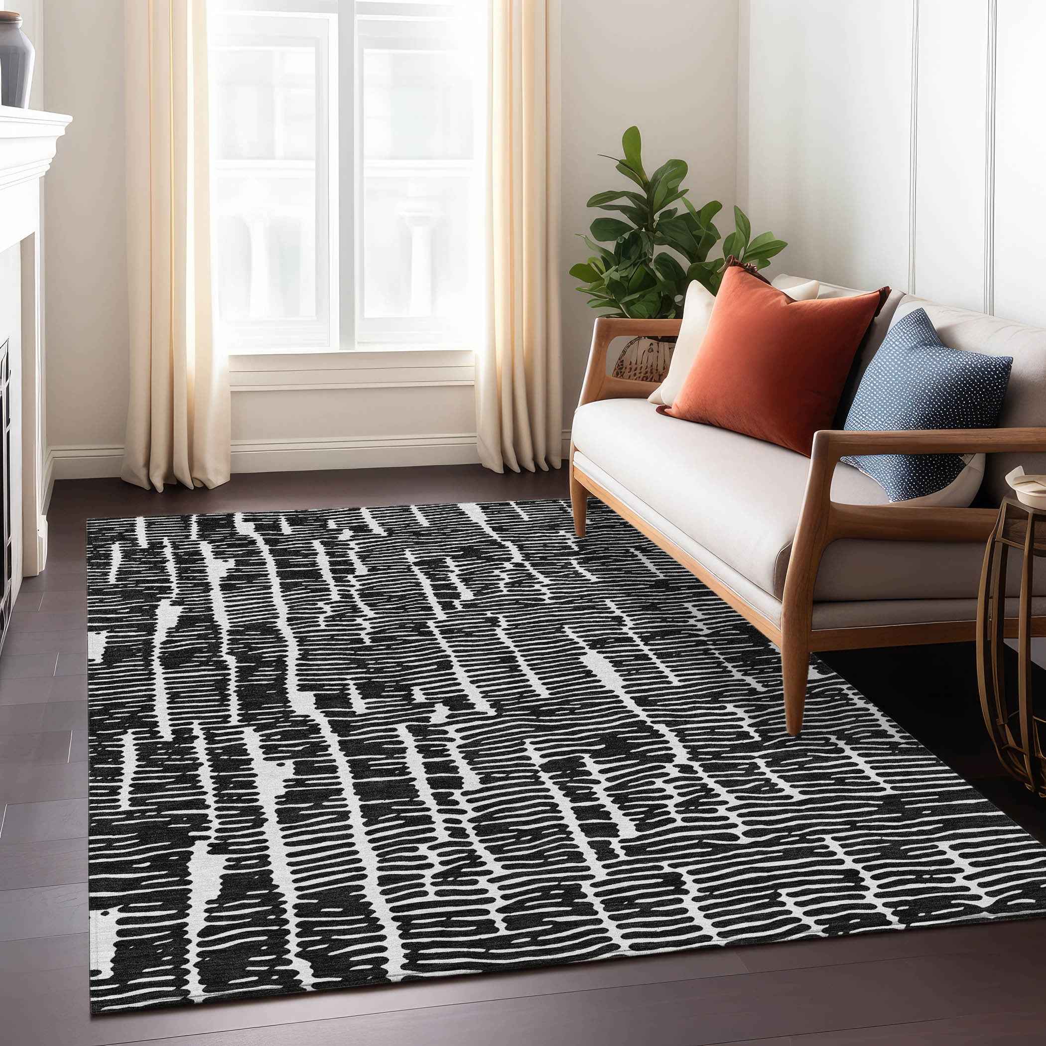 8' X 10' Black And Ivory Abstract Washable Indoor Outdoor Area Rug