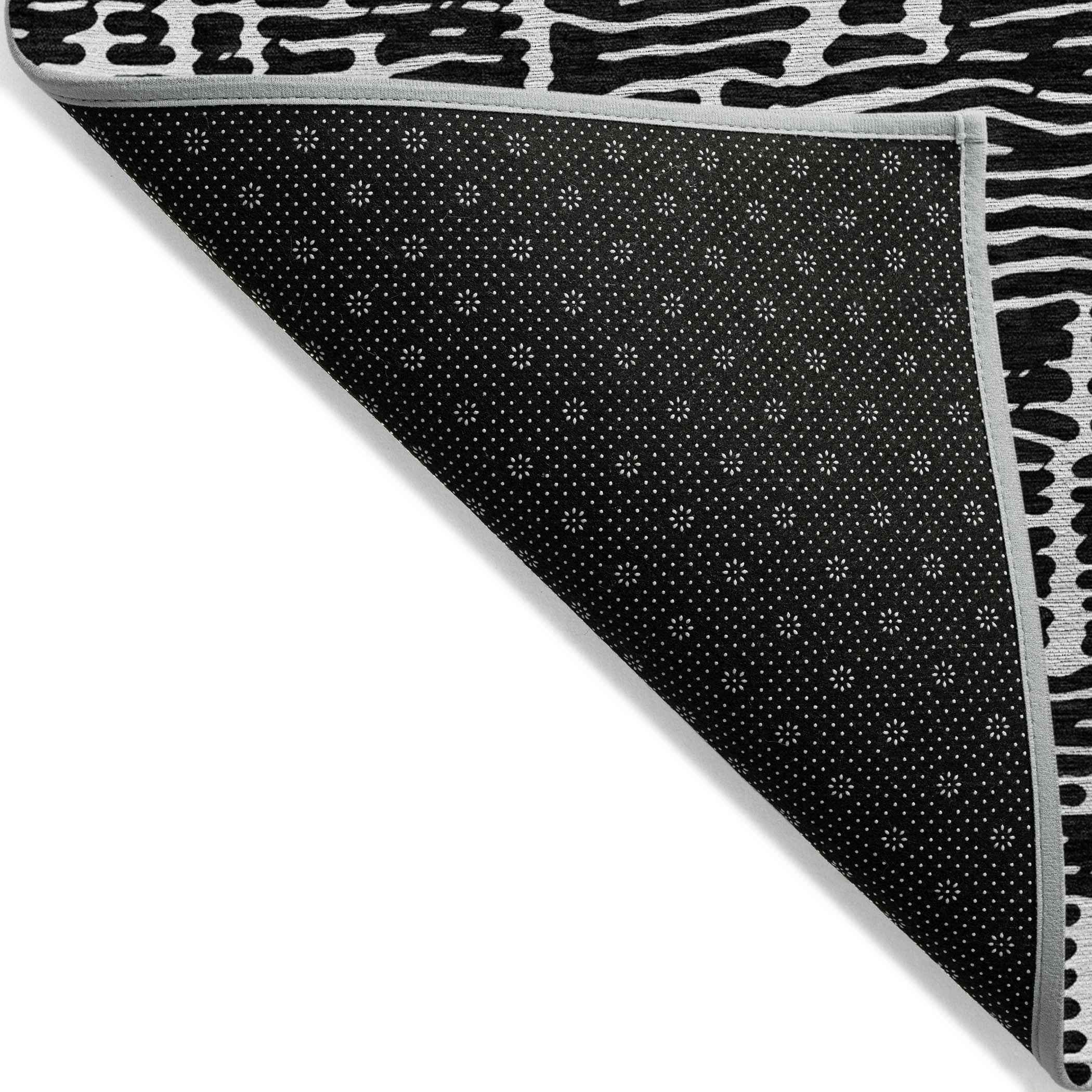 8' X 10' Black And Ivory Abstract Washable Indoor Outdoor Area Rug