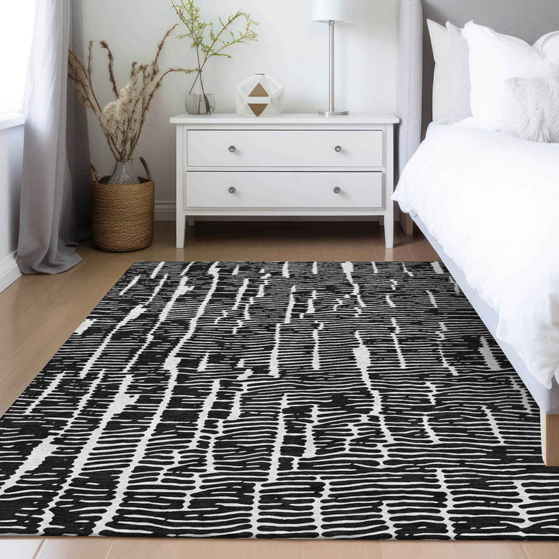8' X 10' Black And Ivory Abstract Washable Indoor Outdoor Area Rug