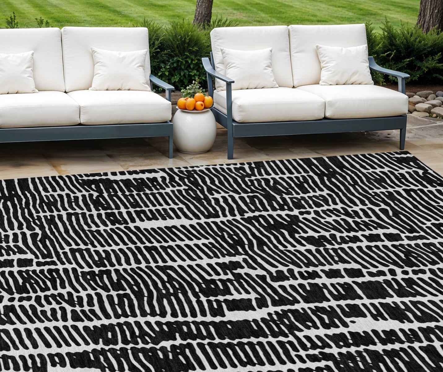 8' X 10' Black And Ivory Abstract Washable Indoor Outdoor Area Rug