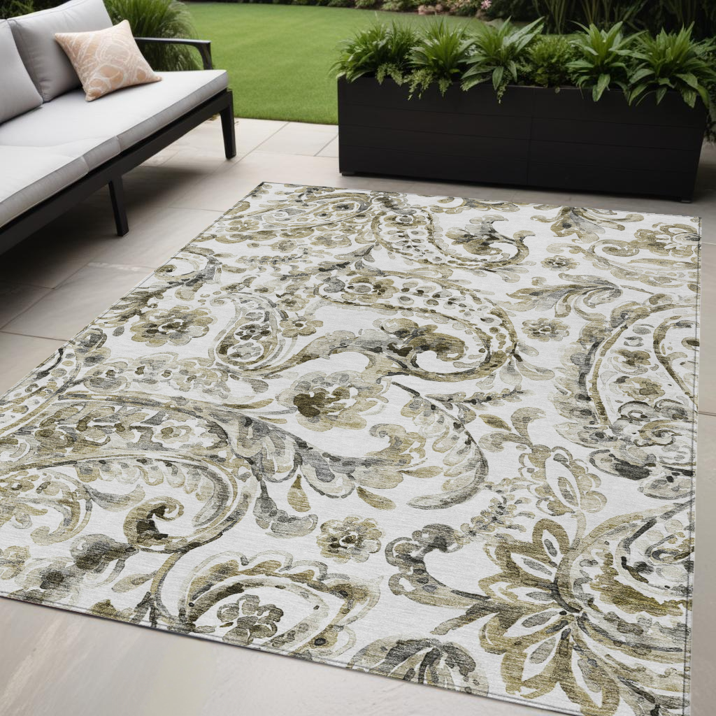 5' X 8' Brown Ivory And Tan Paisley Washable Indoor Outdoor Area Rug