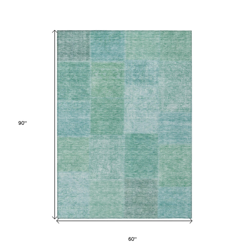 5' X 8' Teal Blue Sage And Green Patchwork Washable Indoor Outdoor Area Rug