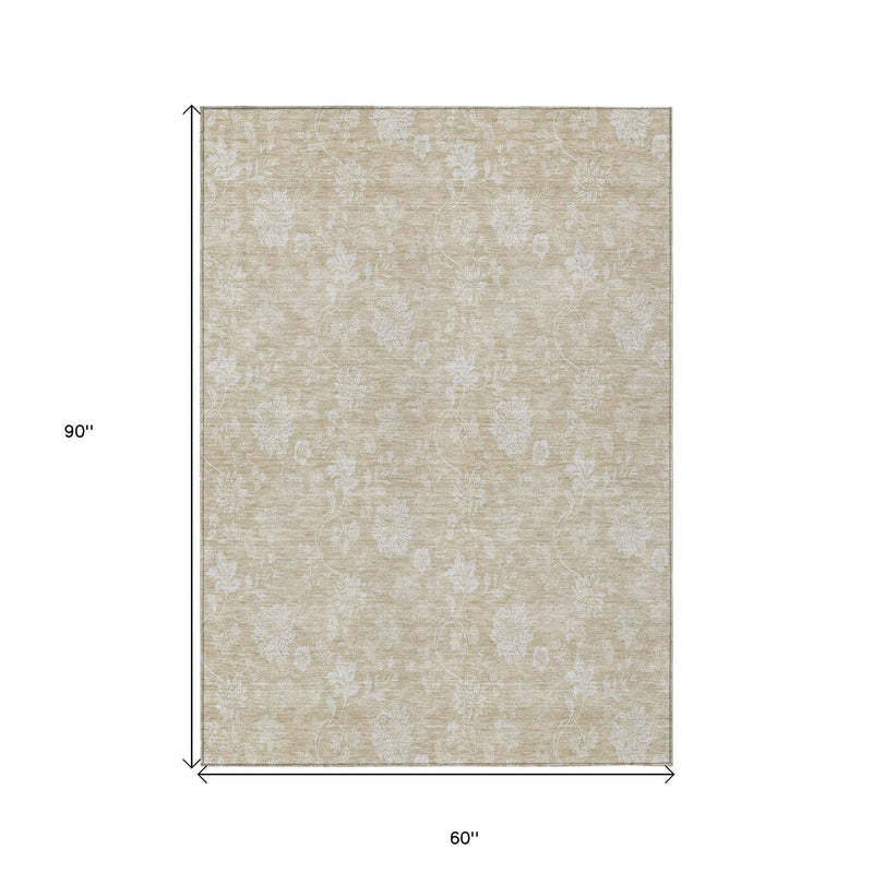5' X 8' Beige Tan And Ivory Floral Washable Indoor Outdoor Area Rug