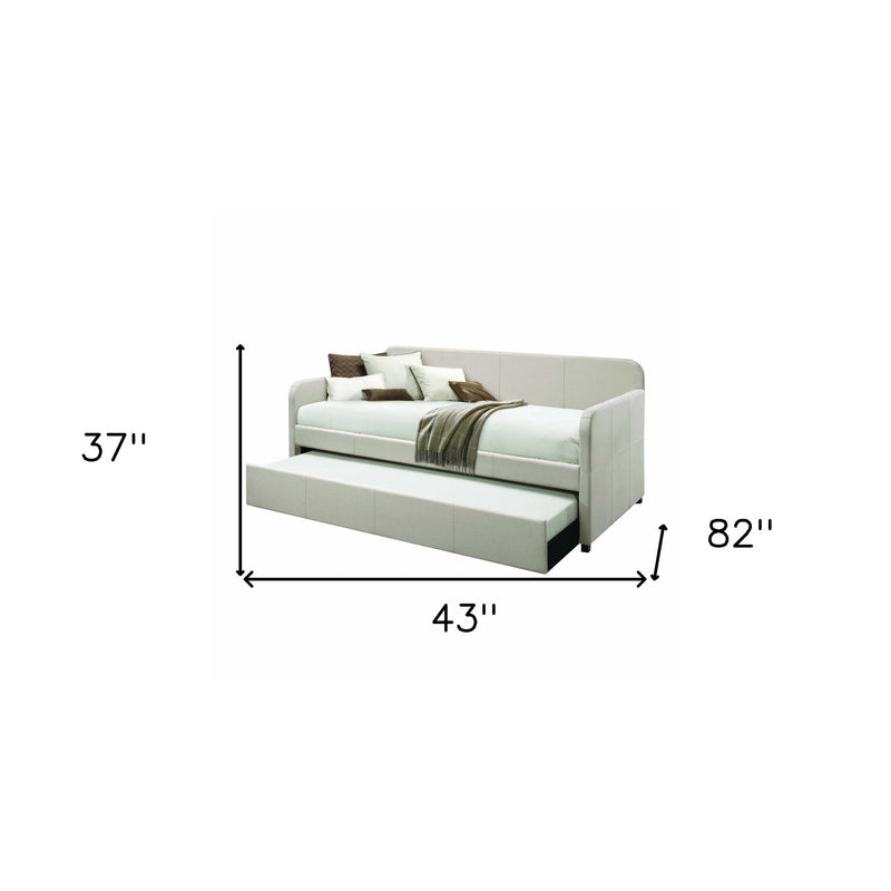 Light gray upholstered twin bed frame, 43" wide and 82" high