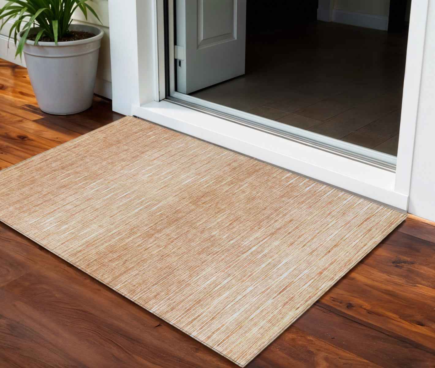 3' X 5' Salmon And Ivory Abstract Washable Indoor Outdoor Area Rug