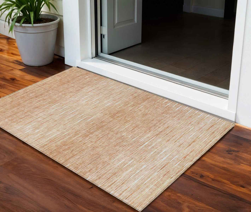 3' X 5' Salmon And Ivory Abstract Washable Indoor Outdoor Area Rug