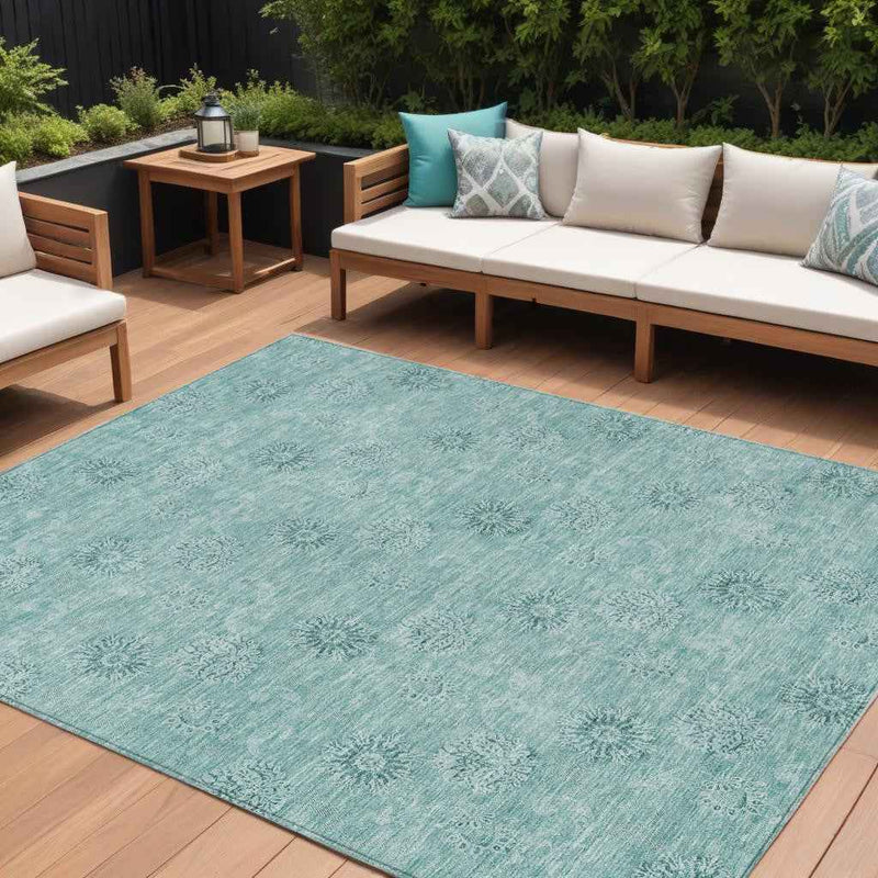10' X 14' Teal Blue And Ivory Floral Washable Indoor Outdoor Area Rug