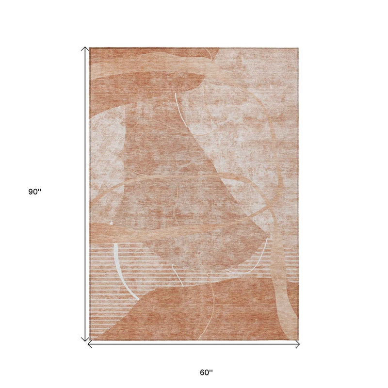 5' X 8' Salmon Copper And Ivory Abstract Washable Indoor Outdoor Area Rug