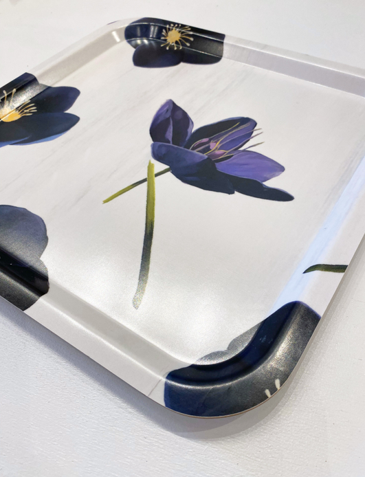 Square serving tray with blue and purple flowers on glossy silver base and raised rim