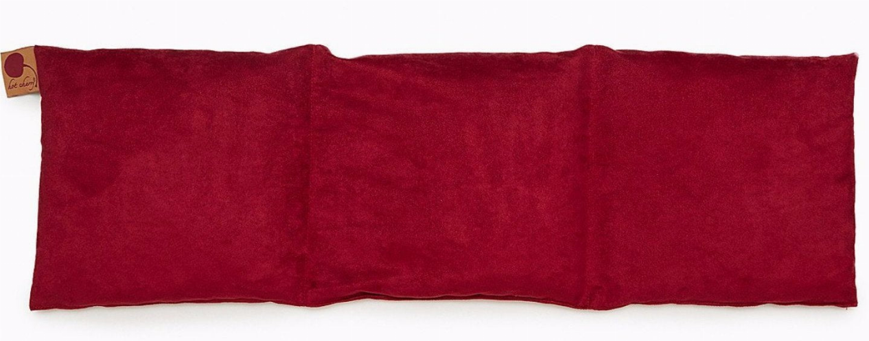 Red triple-square throw pillow with textured suede and stitched sections