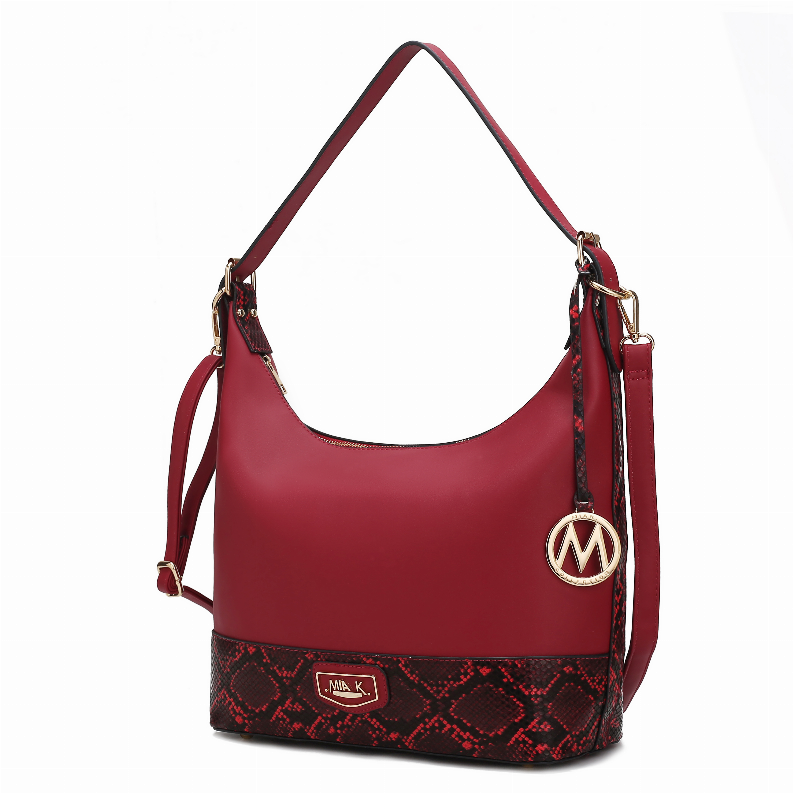 Red shoulder bag with hobo shape, faux snakeskin bottom and side logo charm