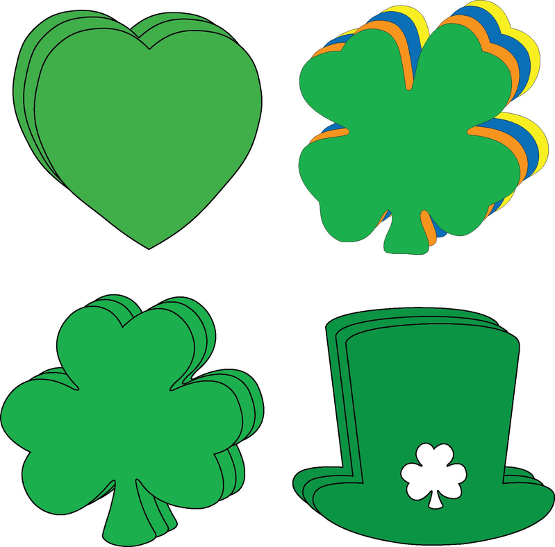 Large cut-out set pieces: green hearts and four-leaf clover, plus a green top hat
