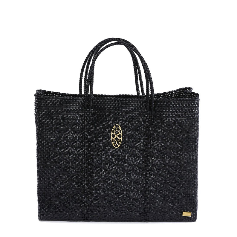Black woven travel tote with oval logo emblem and twin top handles