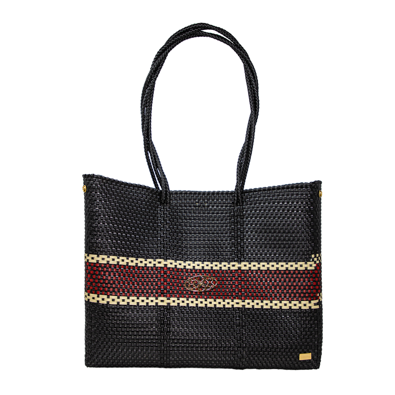 Woven black travel tote with red-and-gold striped band and small gold logo
