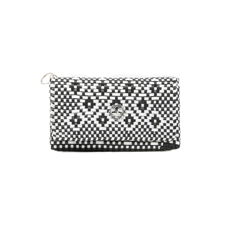 Woven black-and-cream clutch with checkered pattern and gold-tone front clasp