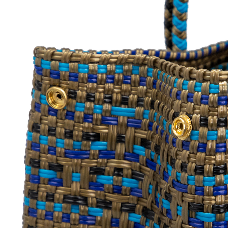 Woven clutch with blue, gold, and black stripe pattern and gold snap hardware