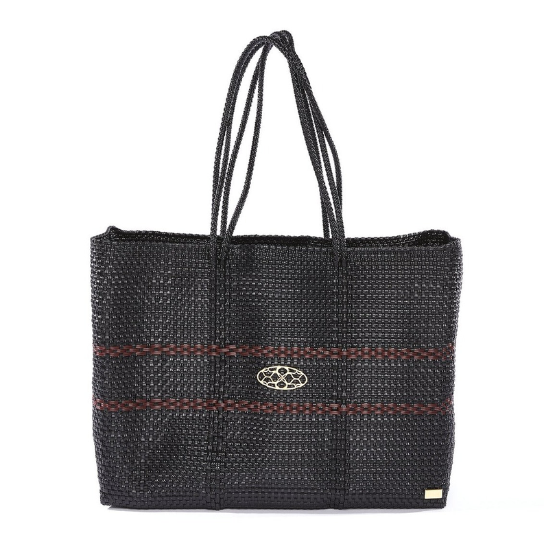 Woven black travel tote with thin red stripe and oval gold logo