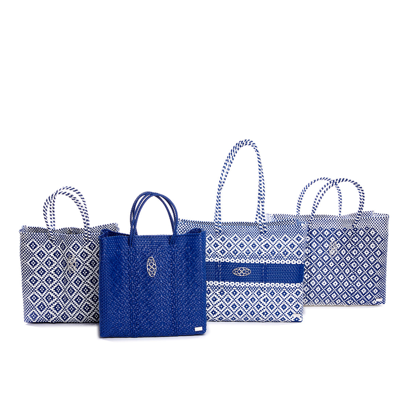 Three woven tote bags set with blue and white patterns, each with top handles