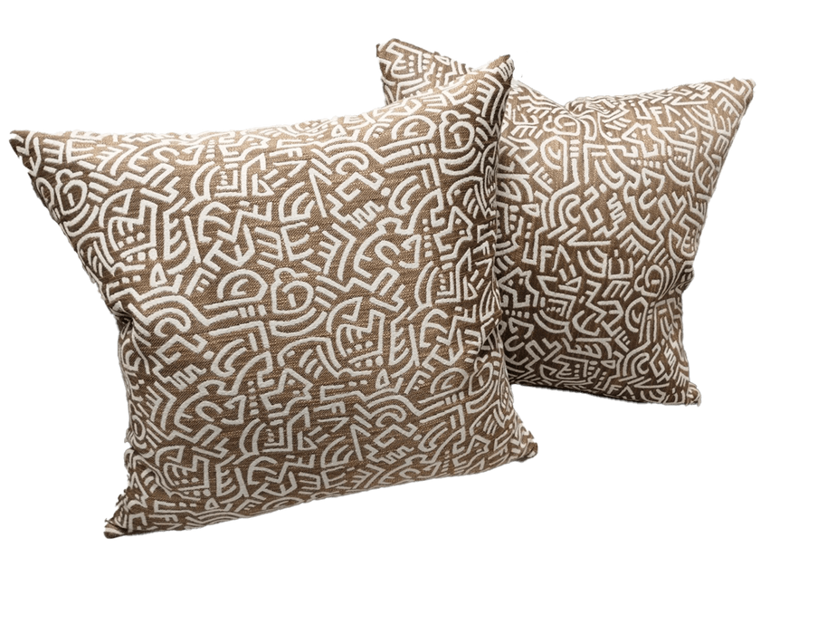 Pop Energy throw pillow, tan cover with white maze-like line design