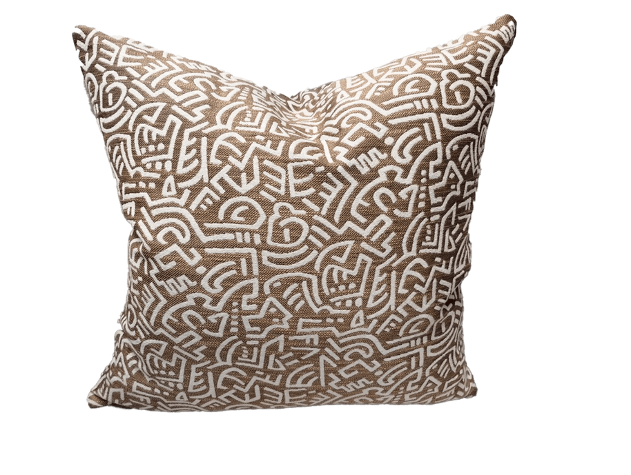 Pop Energy throw pillow with tan fabric and white abstract line maze print