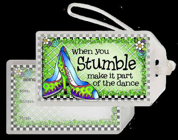 Luggage tag with green grid design, blue high heels, and decorative text on white card