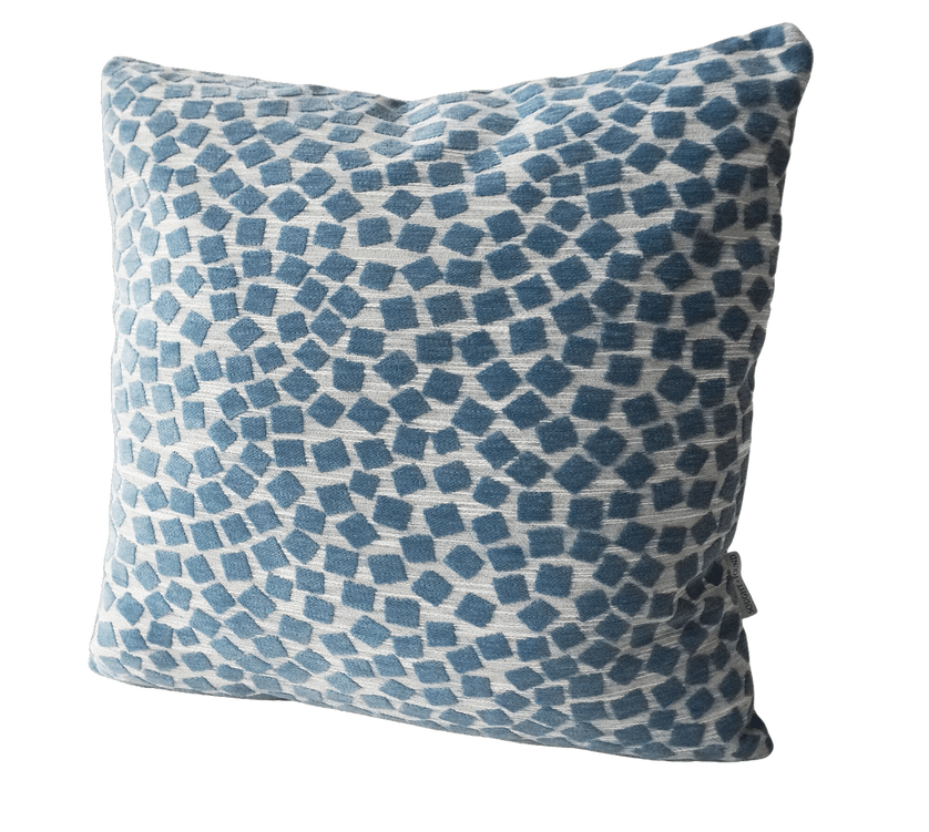 Geometric throw pillow with light blue and navy square pattern, textured fabric