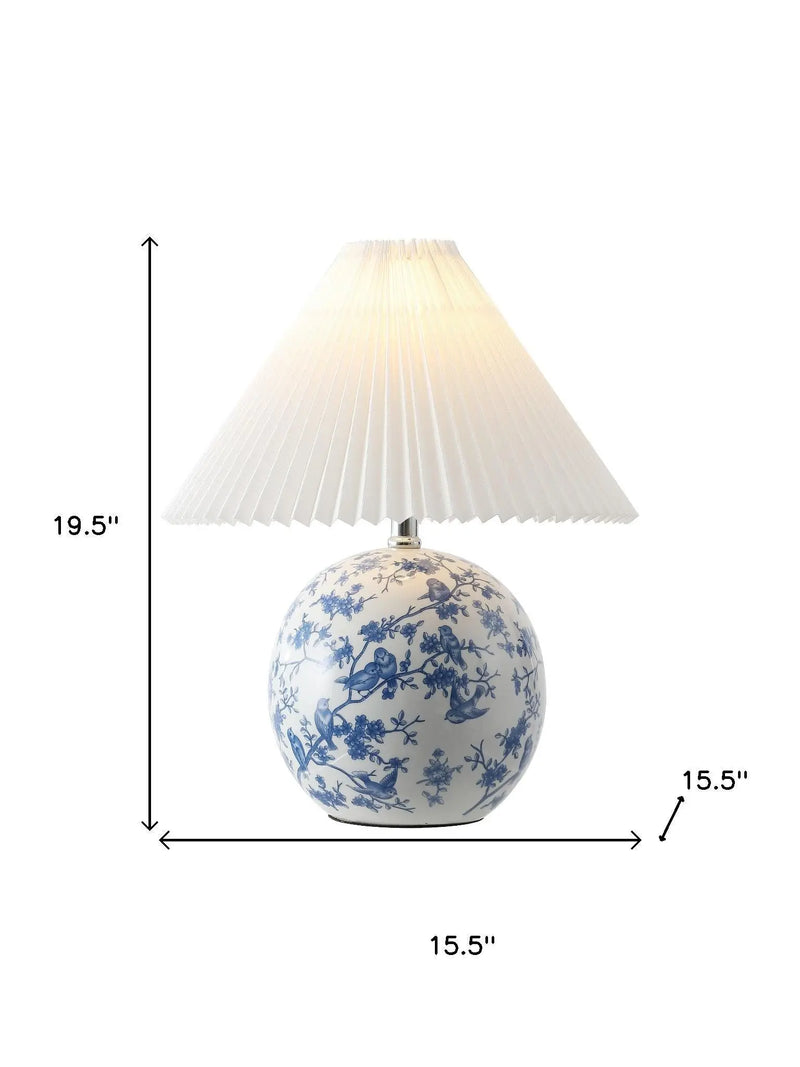 Ceramic table lamp with blue floral design, pleated white shade, height 19.5", base diameter 15.5".