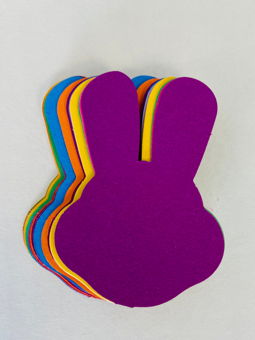Layered rainbow bunny cut-out with solid purple bunny silhouette
