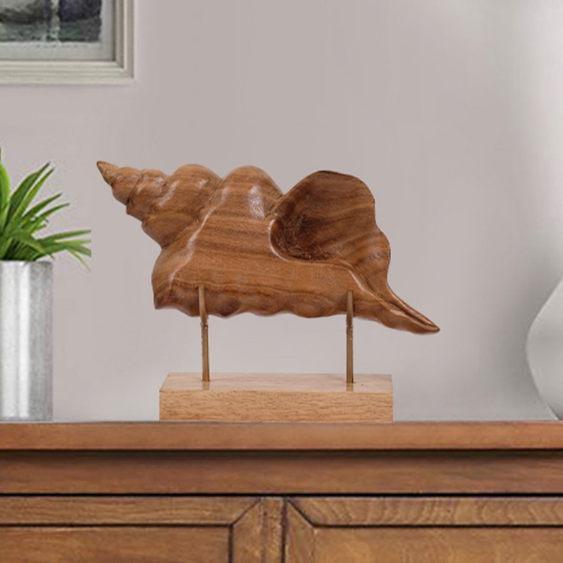 Wooden bird sculpture on stand with warm brown carved finish