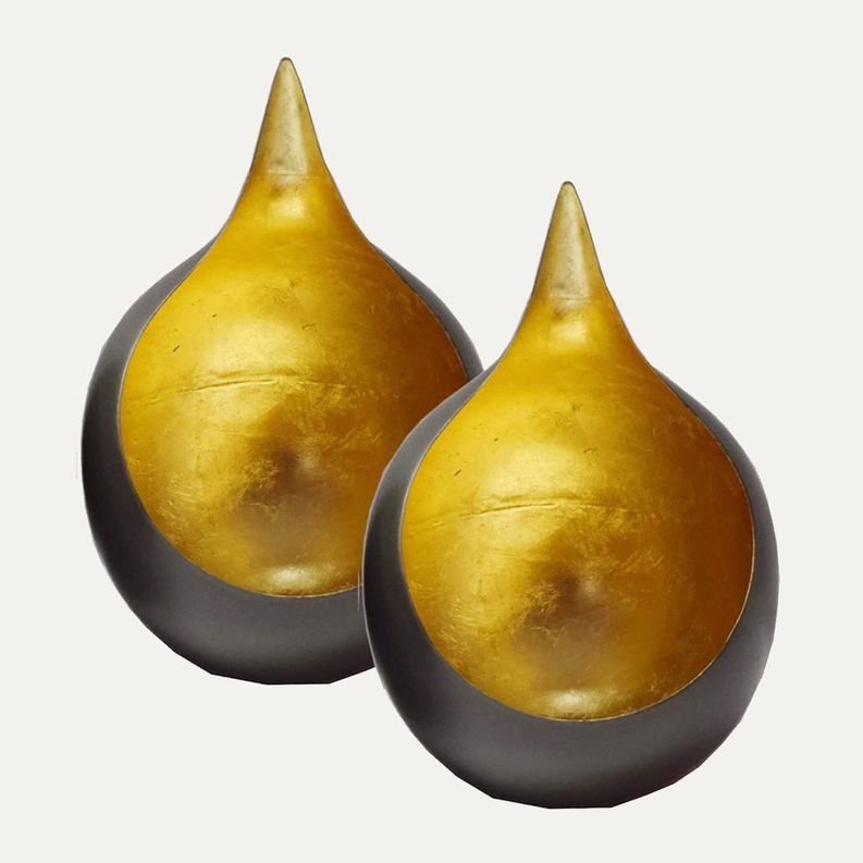 Gold-and-black teardrop tea light candle holders, pair shown