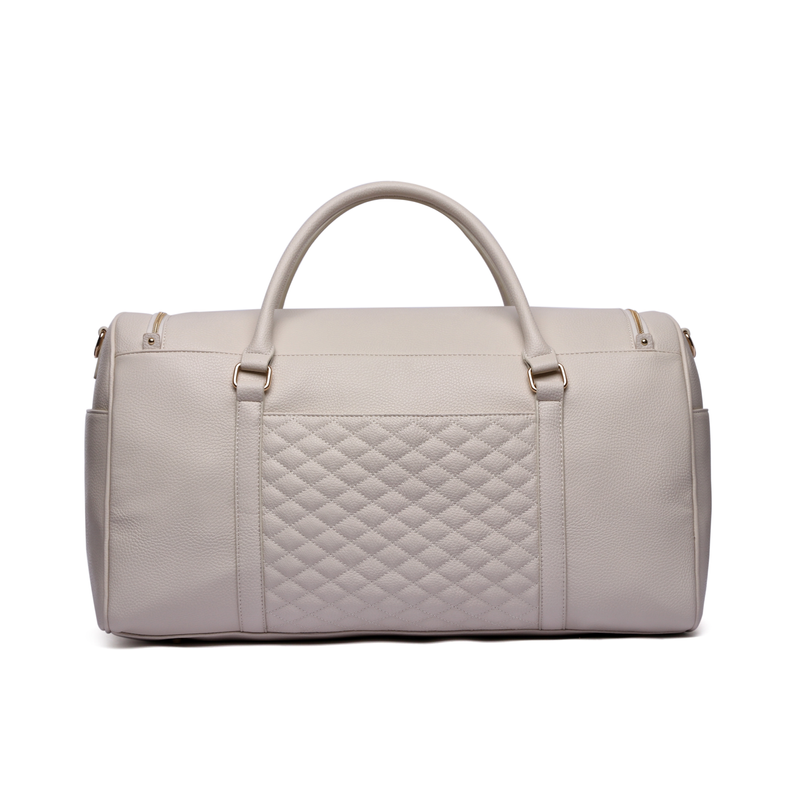 Pearl white travel bag front view with quilted center panel and top handles