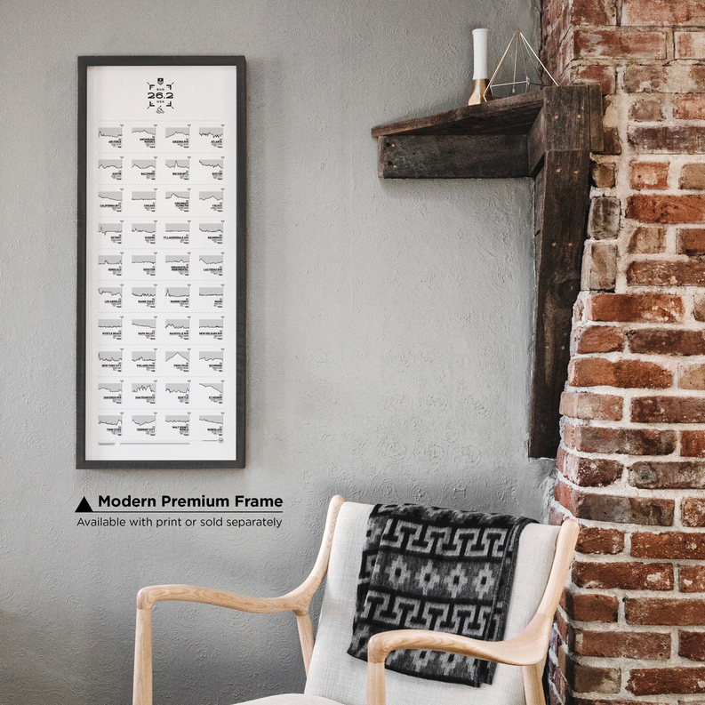 Marathon register print in modern premium frame on wall with chair in foreground