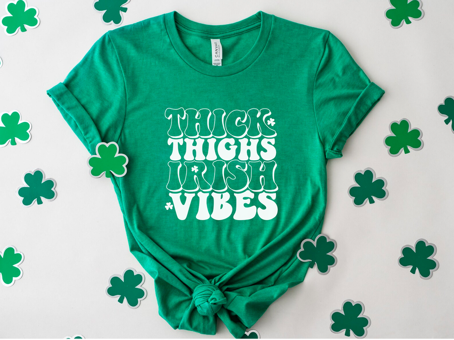 Kelly green crew-neck T-shirt with 'THICK THIGHS IRISH VIBES' front text