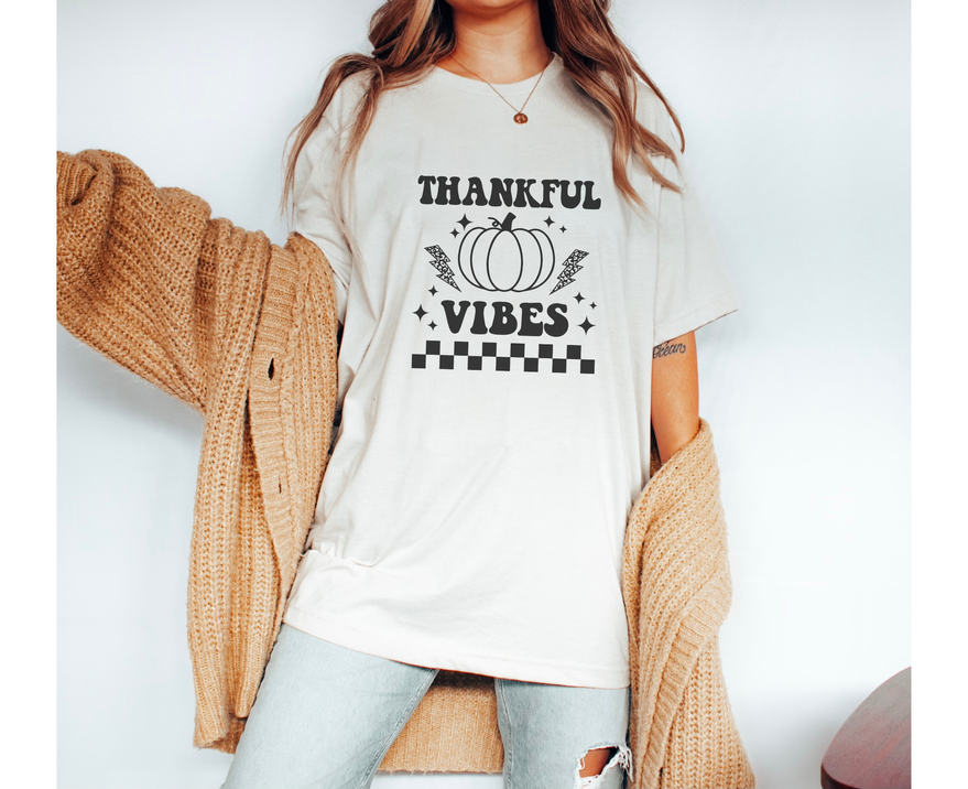 White Thanksgiving tee, 'THANKFUL VIBES' retro pumpkin and star graphic
