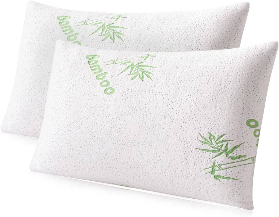Set of 2 support pillows with white bamboo-patterned covers, green accents.