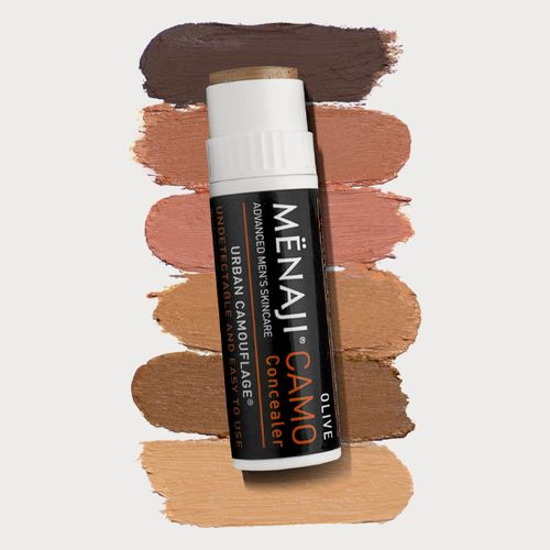 Men's concealer stick with swatch strip of layered brown tones