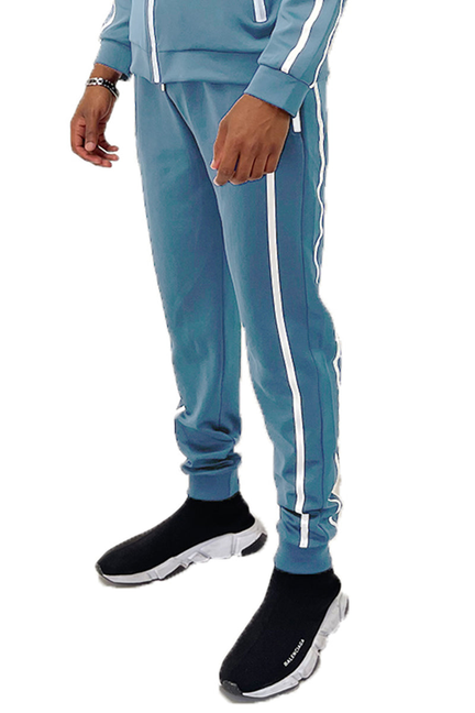 Sky blue joggers with white taping along the legs and tapered cuffs